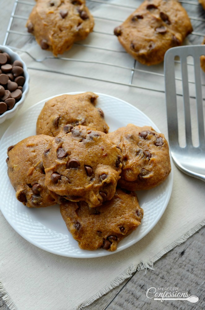 Gluten Free Pumpkin Chocolate Chip Cookies are made with a spice cake mix and they are super easy to make. These soft and fluffy cookies are the best pumpkin cookies you will ever taste. You would never guess that they are gluten free.  
