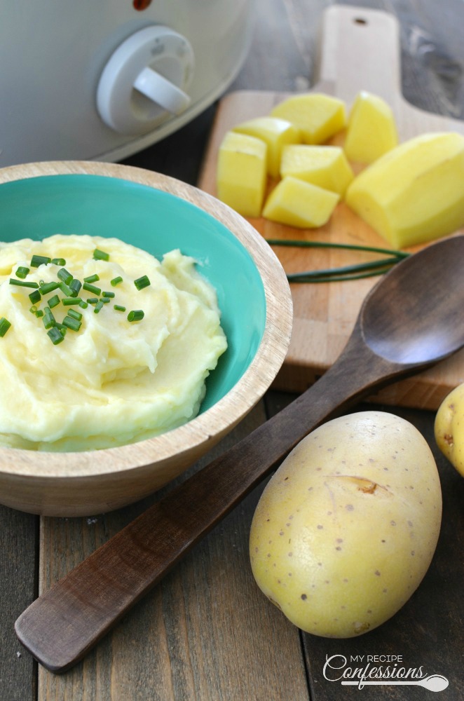 Creamy Slow Cooker Mashed Potatoes will change your life! The cream cheese and garlic gives the potatoes a rich creamy flavor that can't be beat. This make a head recipe is the best and are perfect for Thanksgiving or really any meal! 