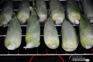 Easy Roasted Corn on the Cob- This is the easiest way to cook corn on the cob. There is no need to husk the corn, just throw it in the oven for 20 -25 minutes. The husk traps the moisture in, resulting in a tender and juicy ear of corn. Once the corn is cooked the husk and silk practically slip right off. After try this recipe, you will never boil corn again! 