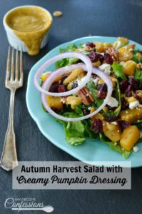 Autumn Harvest Salad with Creamy Pumpkin Dressing is full of all the autumn flavors we love and crave! This salad is packed with butternut squash, dried cranberries, pecans and so much more. The creamy pumpkin dressing recipe is pure magic and really makes this salad pop!