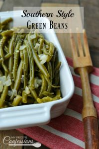 Southern Style Green Beans are the best green beans ever! They are cooked low and slow and as easy as can be. The smoky flavor makes these beans irresistible. I always get asked for the recipe and everybody is always surprised at how easy they are. They are a great side for any holiday dinner.