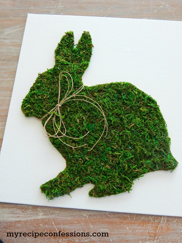 Moss Easter Bunny Sign. Don’t pay an arm and a leg for you Easter home décor, when you can diy. This moss Easter bunny sign is so inexpensive to make, not to mention incredibly easy. You don’t have to be a crafts expert to make this sign. Trust me, anybody can do it! 