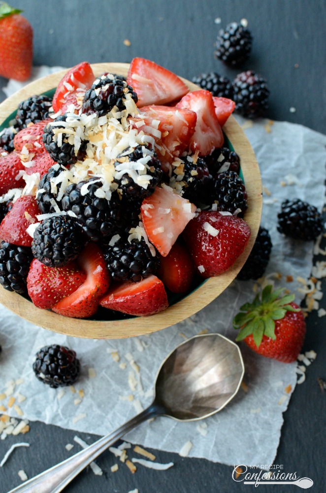 Blackberry and Strawberry Toasted Coconut Salad is the easiest fruit salad recipe you will ever make! The toasted coconut is amazing with the fresh strawberries and blackberries. It's so good you will want to skip dessert and just eat this salad instead!