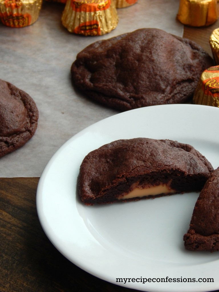 Stuffed Chocolate Cookies. These cookies are so soft and chewy and you get to add your favorite candy bar into the center. They are one of those easy desserts that everybody loves! It’s a great way to use up all the left over Halloween candy! Trust me, if you love cookie recipes, you are going to love this one! 