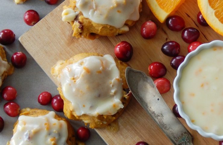Pumpkin Cranberry Cookies with Orange Glaze are all the best holiday flavors combined into one amazing cookie! This cookie has all the delicious fall flavors we all love ! This is my new favorite holiday cookie recipe!