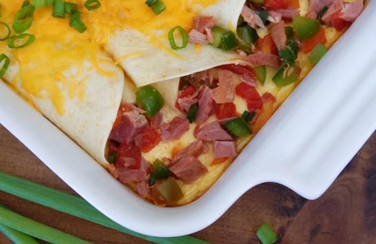 Breakfast Enchiladas. My kitchen smelled amazing when these dish was baking. My family loves to eat breakfast for dinner and this recipe was a huge hit! I have tried smiliar recipes and none of them measure up to this one! It would be a dish to serve at a brunch or even on Easter or Christmas morning.