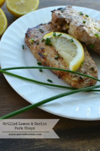 Grilled Lemon Garlic Pork Chops. Just when you thought Summer couldn't get any better, this recipe came along. Don't sweat in the kitchen trying to make dinner each night. Take it outside to the grill with this easy dinner. These pork chops are bursting with flavor and beat out all the other pork chops recipes!