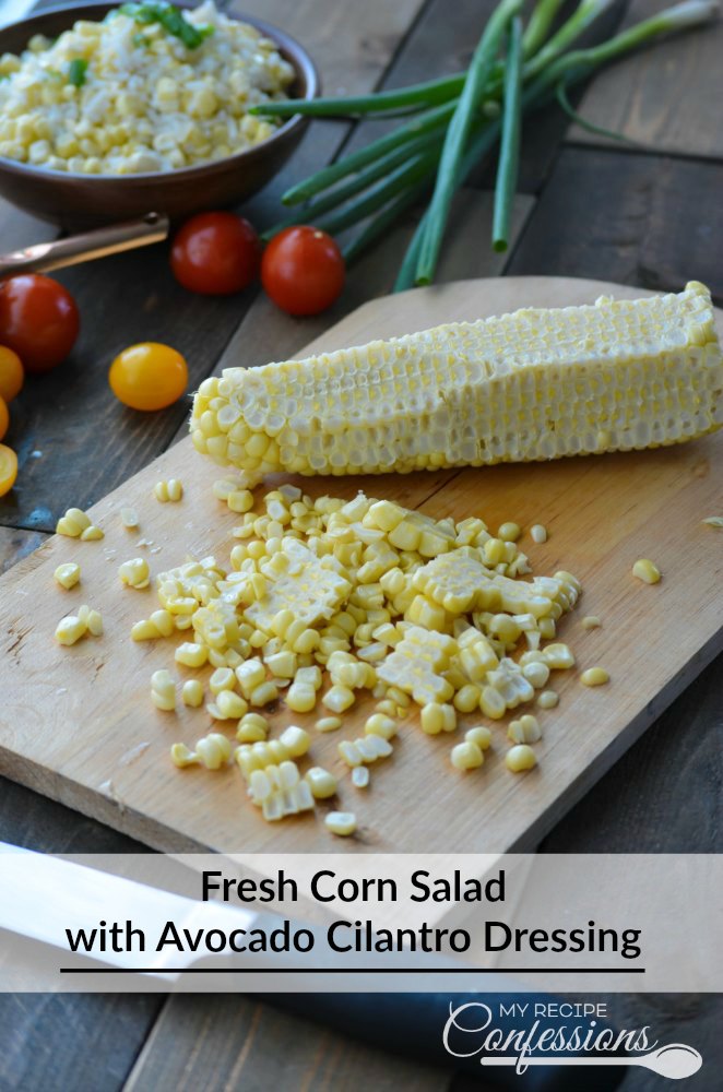 Fresh Corn Salad with Avocado Cilantro Dressing-Look no further for the perfect side salad. This recipe is a must try for sure! It is a vegetarian, gluten-free salad that everybody will enjoy. The avocado cilantro dressing is so good I could drink it from a cup. On top of everything, else it is super easy to make too. 
