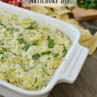 Spinach Artichoke Dip is the best dip ever! This recipe is so easy and it tastes just as good as Applebee's dip. This creamy cheesy dip is always a big hit! Serve it with crackers or tortilla chips for an unforgettable appetizer.