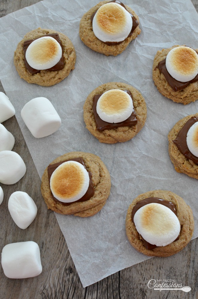 Easy S'more Cookies is the best recipe cookie ever! These cookies are super soft and chewy. The ooey gooey marshmallows and melted chocolate will hook you after just one bite.